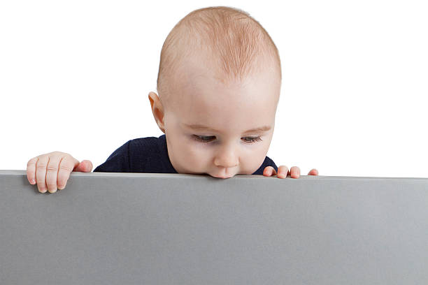 young child holding sign stock photo