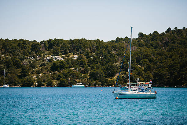 yacht on beautiful blue ocean stock photo