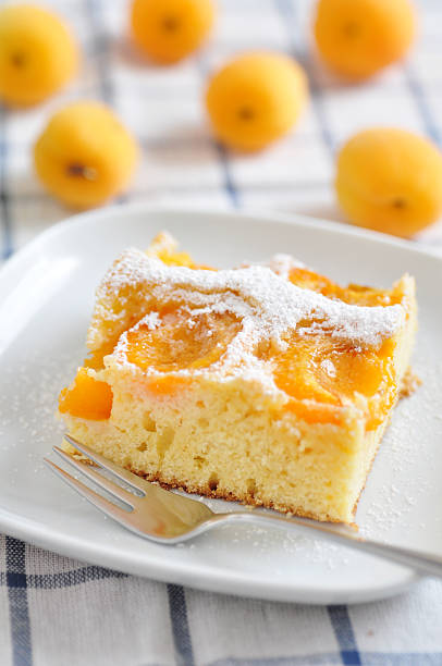 Slices of fresh apricot sponge cake