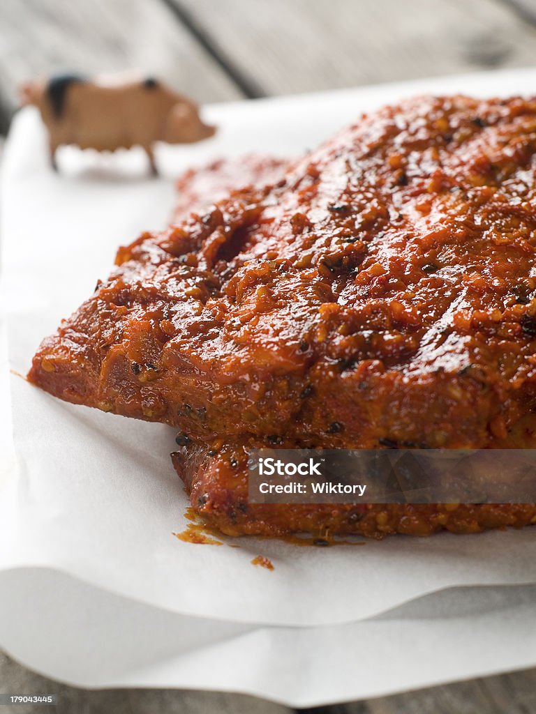 pork ribs BBQ spare ribs marinated in tomato sauce with pepper, selective focus American Culture Stock Photo