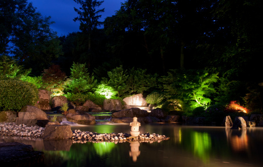 Waterfall in japanese garden at night