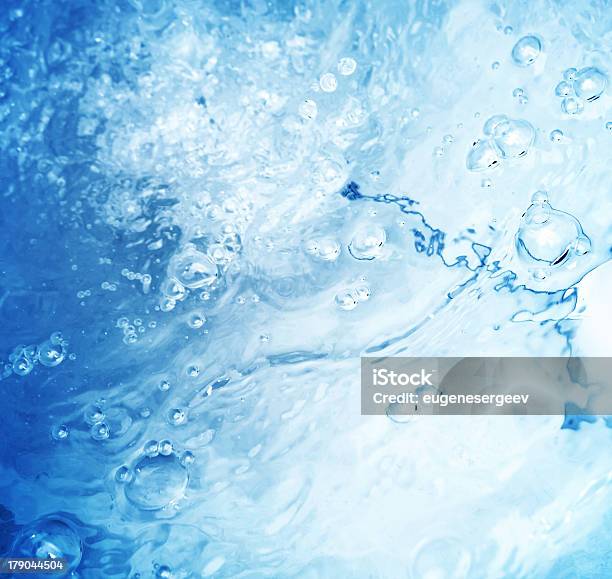 Abstract Blurred Blue Water Surface Background Stock Photo - Download Image Now - Abstract, Blue, Bubble