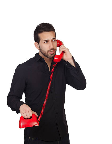 istock Young bearded businessman at phone 179045014