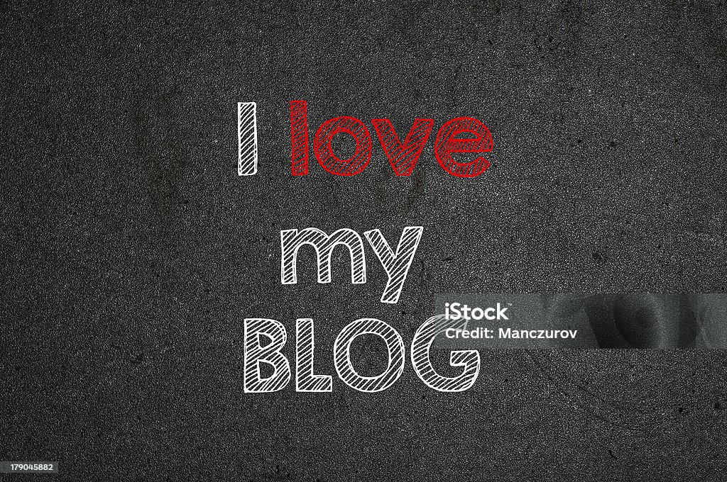 I love my blog handwritten with white chalk I love my blog handwritten with white chalk on a blackboard. Blogging Stock Photo