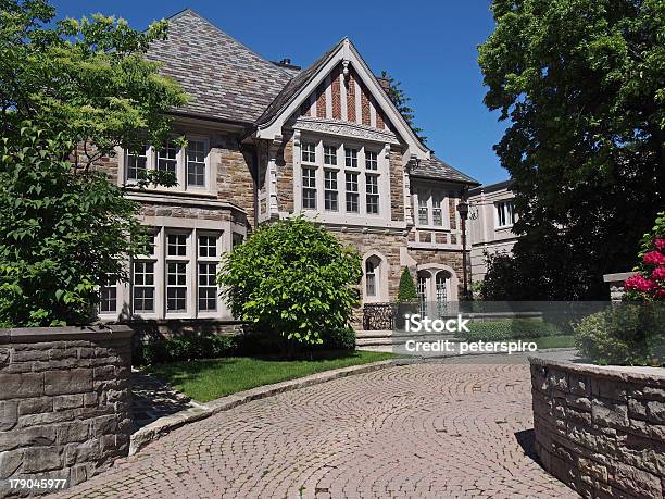 Tudor Style House With Stone Driveway And Greenery Stock Photo - Download Image Now - Tudor Style, Residential Building, House