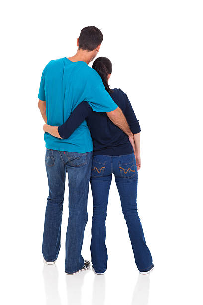back view of young couple Back view of young couple hug and looking man touching womans buttock stock pictures, royalty-free photos & images