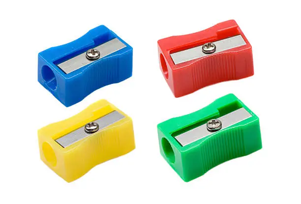 Photo of four pencil-sharpener on a over white background