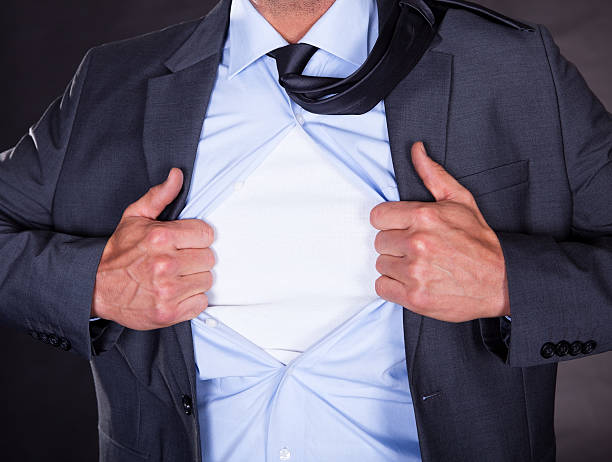 istock Superhero Tearing Off His Shirt 179048236