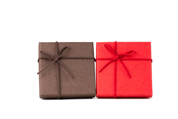istock A brown gift box and a red gift box isolated on white background with clipping path. 1790484064