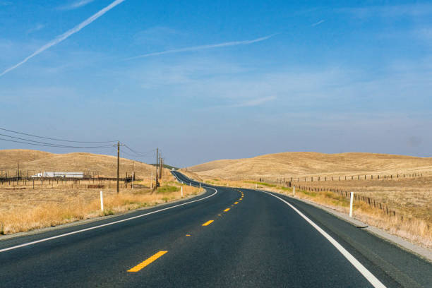 istock Rural Landscape - Single Lane Highway through Rural California 1790484601