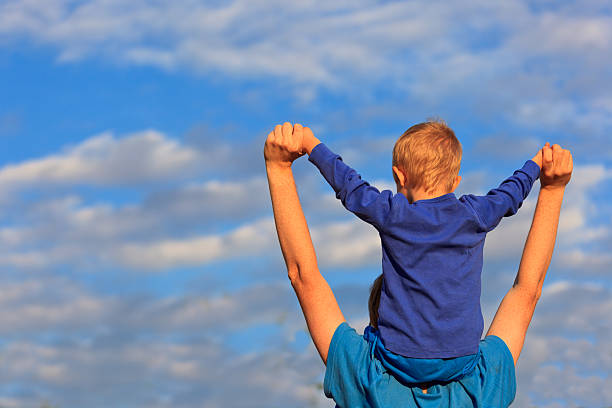 istock happy family with the sky on background 179048735
