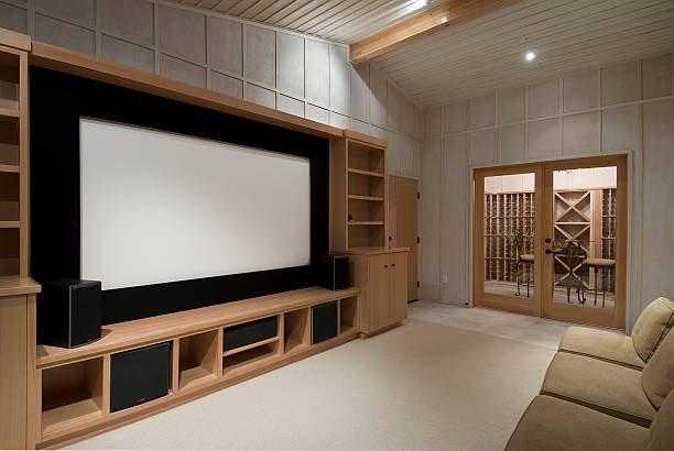 home theater "home theater with wine tasting room, big screen, wood cabinets," surround sound stock pictures, royalty-free photos & images