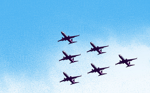 Fleet of Commercial Airliners Flying In V-Formation