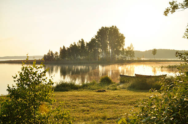 istock Landscape with a boat at dawn 179049245