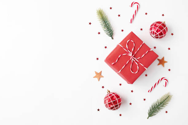 istock Christmas gift with decorations on white background 1790493127
