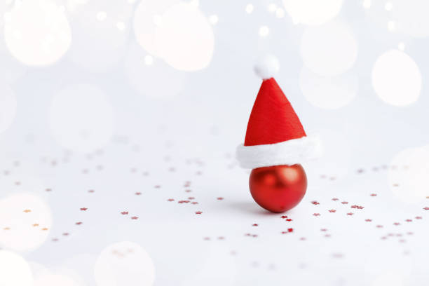 istock Christmas ball with Christmas hat on white background 1790497365