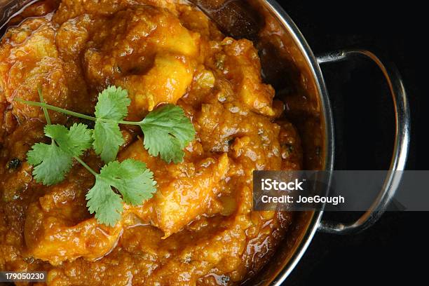 Indian Chicken Curry Stock Photo - Download Image Now - Balti Dish, Black Background, Black Color