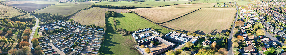 Beautiful High Angle Panoramic View of Letchworth Garden City of England UK During Sunset. The Footage Captured with Drone's Camera on November 11th, 2023