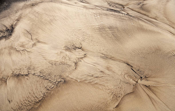 istock Abstract free designs pattern of wet coastal sand 179051005