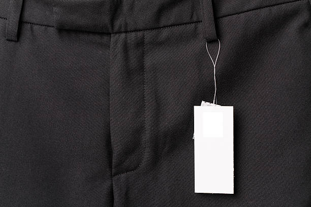 istock black pants close up with white label 179051836