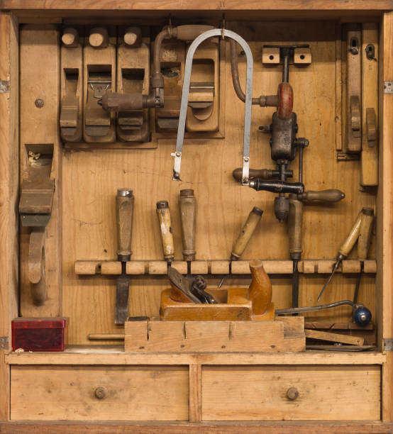 istock carpenters tools in a wooden cabinet 179052357