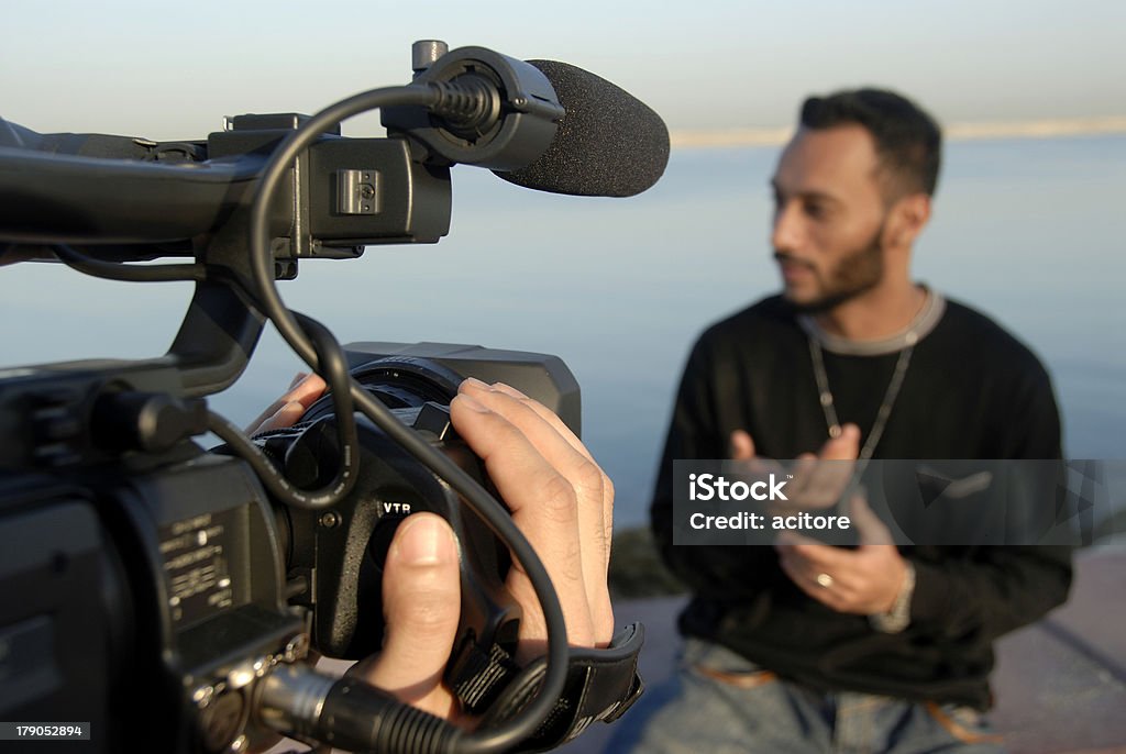 Manuel Focus Actor Explaining Convincingly With Hand Gestures During For Realtime Broadcast Reportage Stock Photo