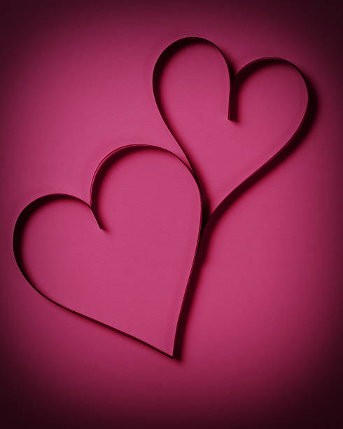 istock two beautiful paper hearts 179052909
