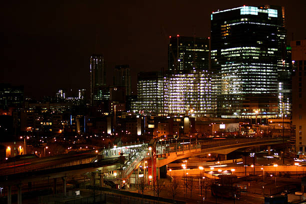 istock modern city at night with buildings being built 179053828