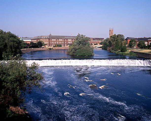 River Derwent, Derby, England. River Derwent with view to the council houses and Cathedral, Derby, Derbyshire, England, UK, Western Europe. derby city stock pictures, royalty-free photos & images