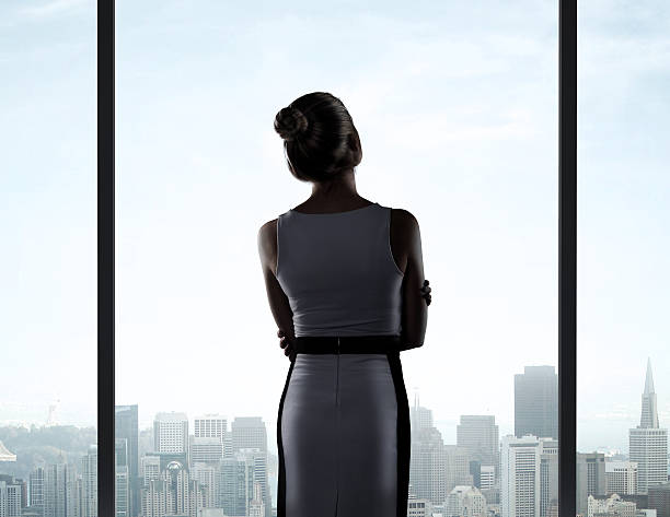 istock businesswoman standing in office 179054620