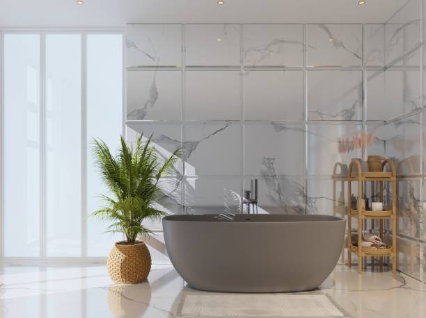 istock Mock up bathroom interior a house with empty tile walls and a tile floor with a comfortable bathtub.3d render 1790555888