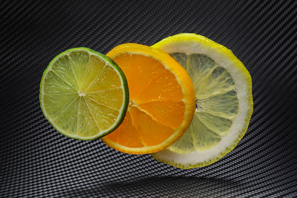 citric mix - fruit lightbox lemon portion foto e immagini stock