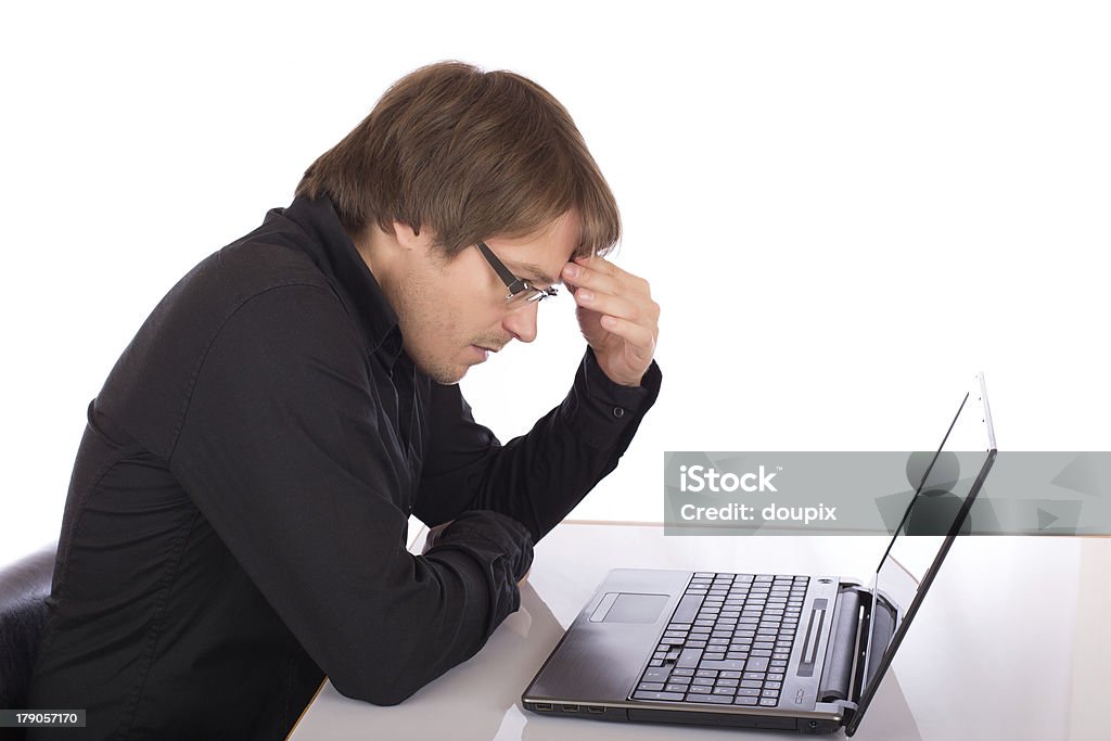 Tired business man thinking about a concept Tired business man thinking about a concept. Isolated on a white background. Adult Stock Photo