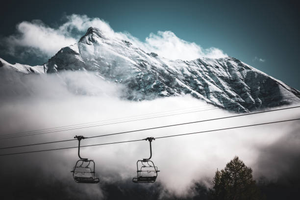 in the swiss alps you can see the change from fall to winter. lower part still fall, higher parts already white