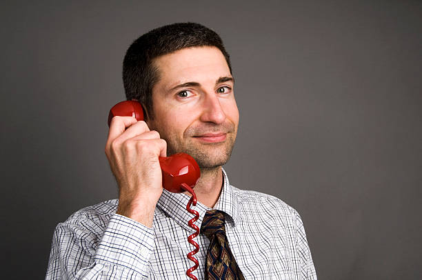 istock Business Man on Red Telephone 179057967
