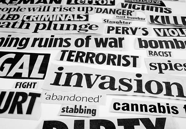 istock Negative newspaper headline cuttings 179058017