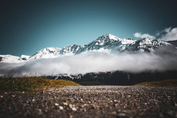 in the swiss alps you can see the change from fall to winter. lower part still fall, higher parts already white