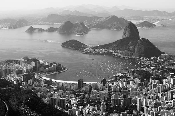 Rio de Janeiro, Brazil.  view from Corcovado Rio de Janeiro, Brazil. Suggar Loaf and Botafogo beach viewed from Corcovado corcovado stock pictures, royalty-free photos & images