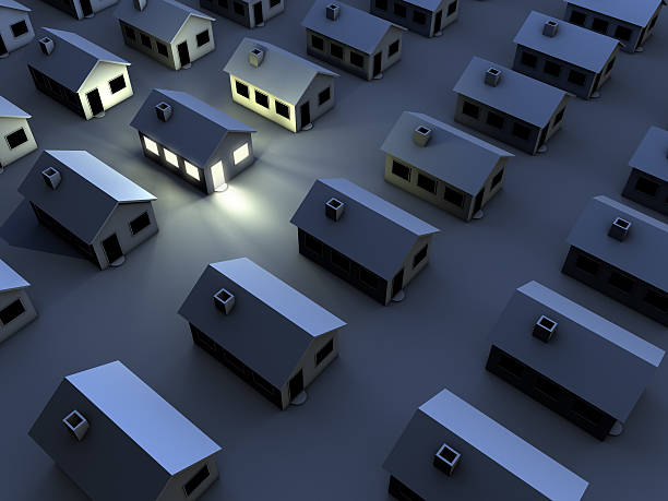 istock housing estate in the night, one house with light 179059574