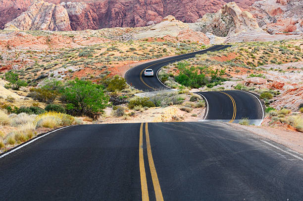 Valley of Fire A road runs through it in the Valley of Fire State Park near Las Vegas Nevada nevada highway stock pictures, royalty-free photos & images