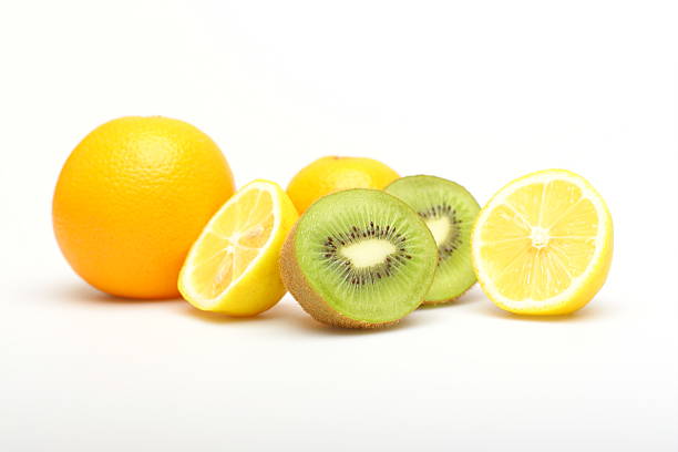 istock orange, lemon and kiwi isolated on white background 179059977