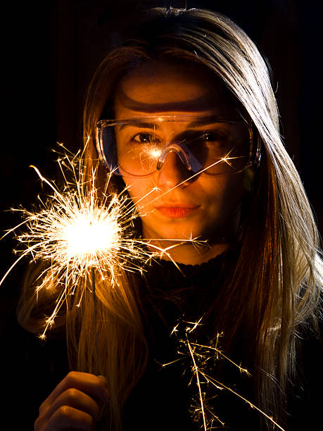 Sparkler in hand. stock photo