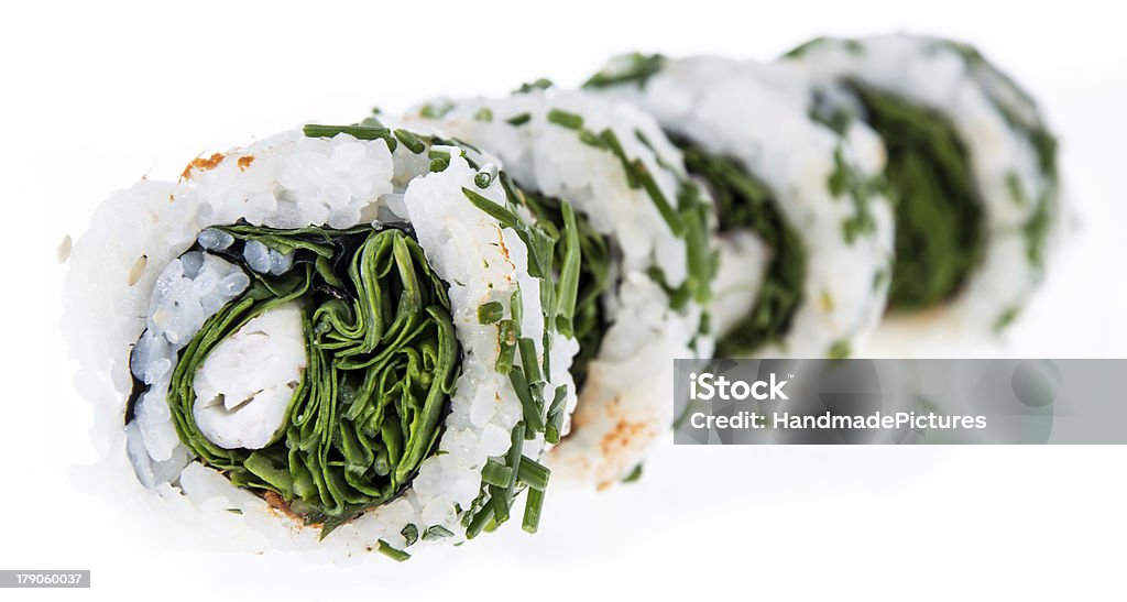 Rollos de Sushi aislado sobre fondo blanco - Foto de stock de Alimento libre de derechos