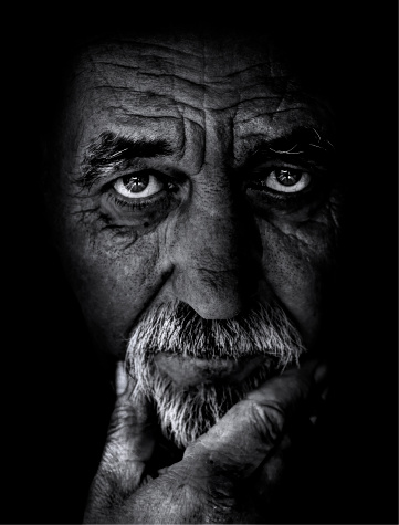 Black and white portrait of a senior man.