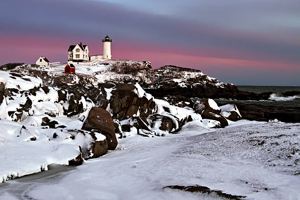 istock Winter's Snow at Nubble Lighthouse 179061003