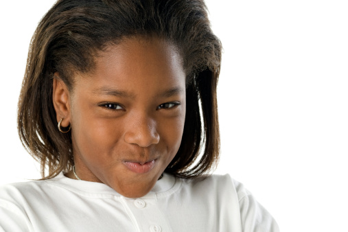 Closeup high key image of a Girl of African Descent gigglingr. Room for Copy.View Similar Images Here:
