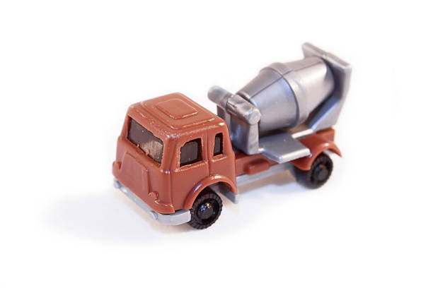 Cement truck on a construction site waiting to pour its concrete.