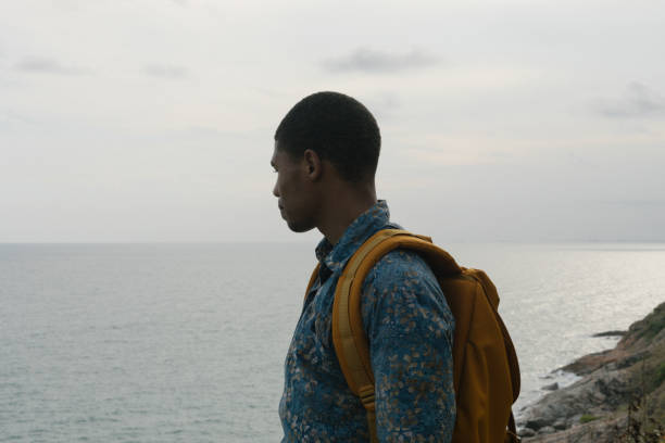 istock Man Looking Out Into The Ocean 1790617147