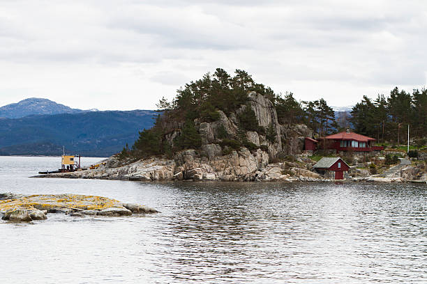 istock house at coastline on small island 179063220