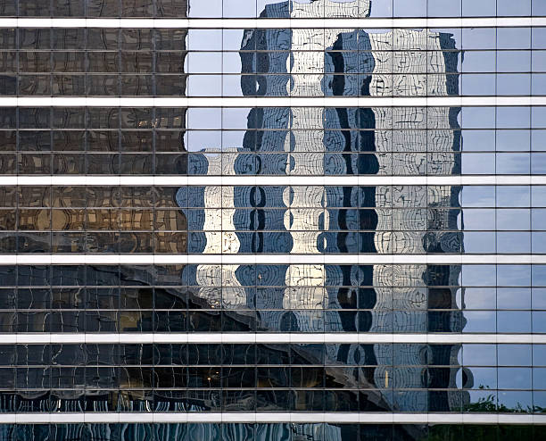 istock Reflection in windows of office building 179063824
